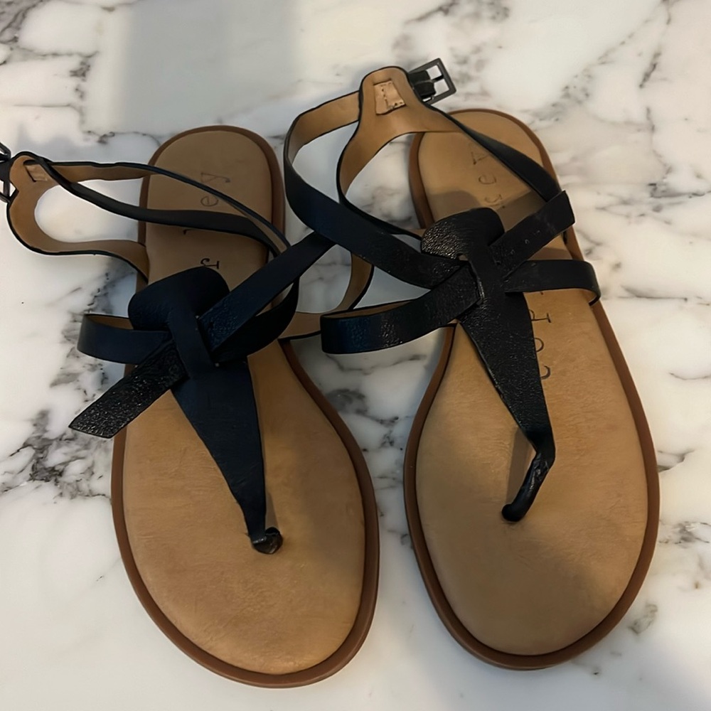 Copper key sandals.